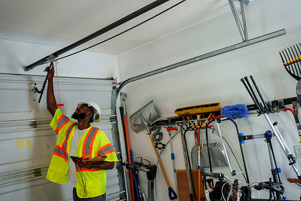 Professional Garage Door Panel Replacement technician working in Vian, OK